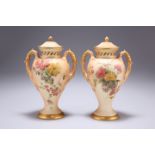 A PAIR OF ROYAL WORCESTER BLUSH IVORY POT POURRI VASES AND COVERS, of two-handled baluster form,