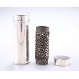A NUTMEG GRATER TUBE HOLDER, the white metal tube of cylindrical form with removable lid, containing