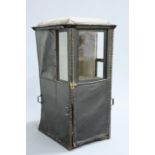 A MID 18TH CENTURY ENGLISH SEDAN CHAIR, covered in leather, with dome top, glazed sides and hinged