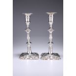 A PAIR OF EARLY GEORGE III SILVER CANDLESTICKS, by Elizabeth Cooke, London 1764, each with