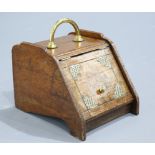 A VICTORIAN BRASS MOUNTED OAK SLANT FRONT COAL BOX, with tin liner and shovel. 40cm high