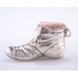 AN EDWARDIAN SILVER PIN CUSHION IN THE FORM OF A BOOT, by John Thompson & Sons Ltd, Birmingham 1909,