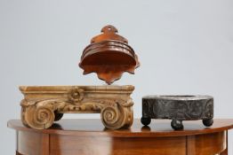 TWO ANTIQUE OAK CARVINGS, together with A VICTORIAN MAHOGANY WALL POCKET (3)The absence of a