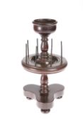 A VICTORIAN MAHOGANY BOBBIN STAND, CIRCA 1860, with trefoil base. 27cm high