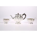 A VICTORIAN SILVER THREE-PIECE TEA SERVICE, by Elkington & Co Ltd, Sheffield 1896, comprising teapot