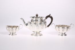 A VICTORIAN SILVER THREE-PIECE TEA SERVICE, by Elkington & Co Ltd, Sheffield 1896, comprising teapot