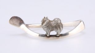 A GEORGE V SILVER WISHBONE NAPKIN RING, makers marks rubbed, Birmingham 1917, in the form of a