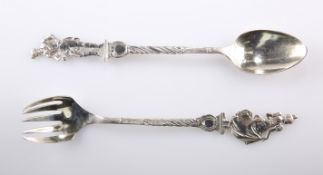A PAIR OF BERTHOLD MULLER SILVER SALAD SERVERS, London import mark 1911, the five tine fork and