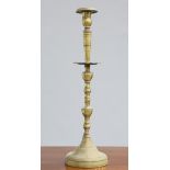 ~ A LARGE 18TH CENTURY BRASS CANDLESTICK, with domed base and knopped baluster stem. 68.5cm high