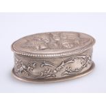 A VICTORIAN SILVER BOX, probably Henry Adcock, Birmingham 1897, oval form, with embossed foliate