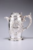 A VICTORIAN SILVER CHASED FLAGON, by Richard Martin & Ebenezer Hall, London 1883, of large