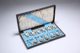 A SET OF ELEVEN SILVER 'FLORAL' DEMITASSE SPOONS, probably Tiffany & Co, each stamped '90', in a