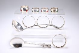 A GROUP OF SILVER AND PLATE, comprising four white-metal 'jewelled' napkin rings; a large Viners