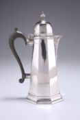 AN EDWARD VII SILVER COFFEE POT, by Thomas Bradbury & Sons, Ltd, London 1907, of slender panelled