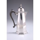 AN EDWARD VII SILVER COFFEE POT, by Thomas Bradbury & Sons, Ltd, London 1907, of slender panelled