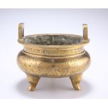 A CHINESE BRONZE CENSER, with tripod feet, decoration of flowerheads and birds, bears cast seal