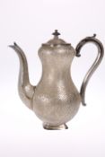 A KASHMIRI WHITE METAL COFFEE POT, 19TH CENTURY, of waisted baluster form, decorated with