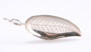 A GEORGE IV SILVER CADDY SPOON, possibly Joseph Taylor, Birmingham 1823, the leaf pattern bowl