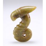 A CHINESE JADE PENDANT, carved as a locust.  7cm