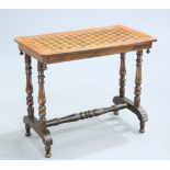 A VICTORIAN INLAID WALNUT SIDE TABLE, the rectangular parquetry top raised on turned legs. 69.5cm