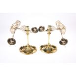 A PAIR OF LATE VICTORIAN BRASS CANDLESTICKS, each with lobed base; together with A PAIR OF ART