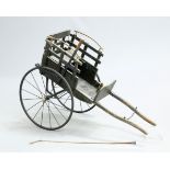 A VICTORIAN SCOTTISH BRASS MOUNTED AND PAINTED DOG CART, fitted with a brake and accompanied by a