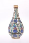 AN OTTOMAN BOTTLE-SHAPED FLASK AND STOPPER, 19TH CENTURY, of baluster form, painted with foliage.