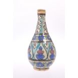 AN OTTOMAN BOTTLE-SHAPED FLASK AND STOPPER, 19TH CENTURY, of baluster form, painted with foliage.