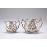 AN EDWARDIAN SILVER CREAM JUG AND SUGAR BOWL IN THE TENIER STYLE, by Sydney Bellamy Harman, London