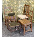 A PAIR OF EARLY 19TH CENTURY OAK COUNTRY CHAIRS, each with plank seat; together with TWO FURTHER