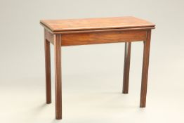 A GEORGE III MAHOGANY FOLDOVER CARD TABLE, the moulded rectangular top with green baize lined