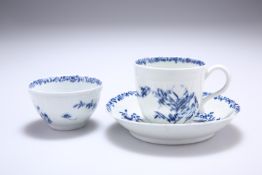 A WORCESTER FEATHER MOULD FLORAL TRIO, CIRCA 1760, comprising coffee cup, tea bowl and saucer,