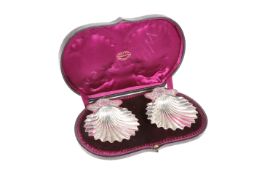 A PAIR OF LATE VICTORIAN SILVER BUTTER DISHES, by William Padley & Son, Sheffield 1891, of shell-