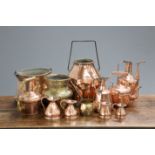 A LARGE COLLECTION OF 19TH CENTURY AND LATER COPPER AND BRASS WARES, including churn, kettles,