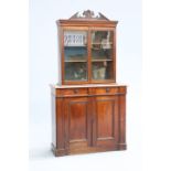 A MAHOGANY BOOKCASE CABINET, the glazed upper section with broken arch pediment, the associated base