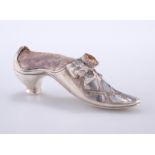 A VICTORIAN SILVER PIN CUSHION IN THE FORM OF A SHOE, by Adie & Lovekin Ltd, Birmingham 1890, in the