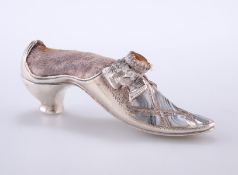 A VICTORIAN SILVER PIN CUSHION IN THE FORM OF A SHOE, by Adie & Lovekin Ltd, Birmingham 1890, in the