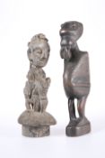 TRIBAL: TWO CARVED FIGURES, one of them modelled riding an animal