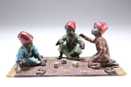 AFTER FRANZ BERGMAN, A COLD-PAINTED BRONZE GROUP, depicting three Arab boys playing dice on a