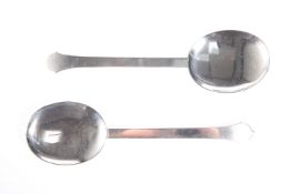 A PAIR OF ART DECO STERLING SILVER SERVING SPOONS, each with shallow oval bowl, stamped 'STERLING
