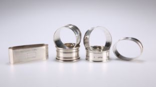 A COLLECTION OF SIX SILVER NAPKIN RINGS, comprising four circular and two oval, including one by