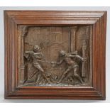 A FLEMISH SPELTER PANEL, 19TH CENTURY, cast in high relief with a sword fight, in an oak frame. 50cm