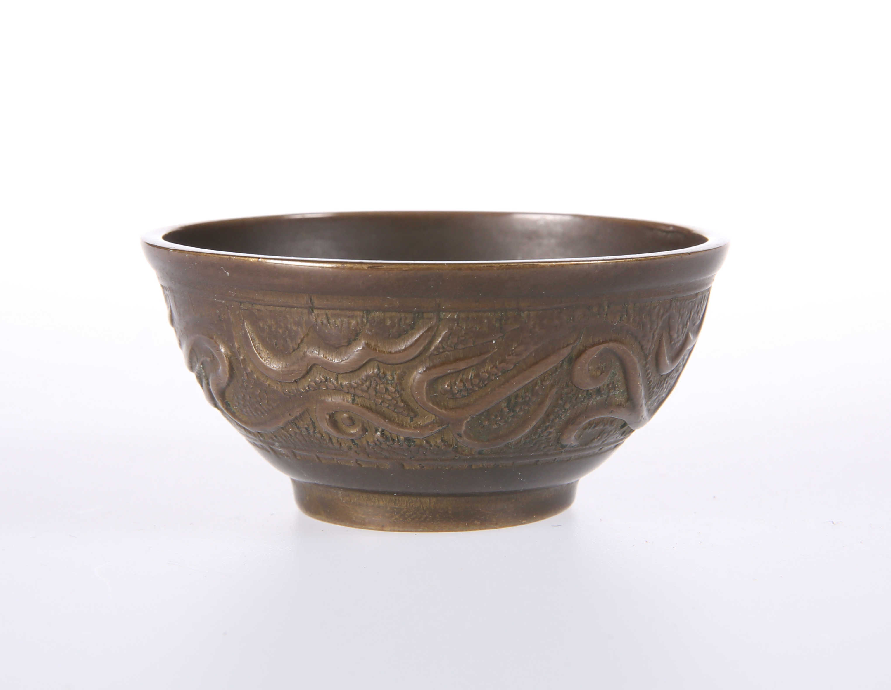 A SMALL ISLAMIC COPPER BOWL