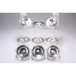 A SET OF TWELVE SILVER ARMADA DISHES, by Richards & Knight, London 1987, 1989 and 1994. 9.5cm in