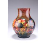 WALTER MOORCROFT A LARGE FLAMBE ANEMONE VASE, of squat baluster form, painted initials and