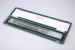 A CONTEMPORARY PREMIER RULE SILVER RULER, by Richard Jarvis, London 2003, modelled as a ruler