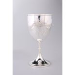 A CHINESE WHITE METAL GOBLET, CIRCA 1900, chased front and back with a floral spray, raised on a