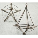 A PAIR OF WROUGHT IRON HANGING CEILING LIGHTS, CIRCA 1900, circular with whiplash shaped supports.