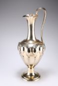 AN IMPRESSIVE VICTORIAN SILVER-GILT EWER, possibly by James Charles Eddington, London 1857, of large