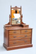 A LATE VICTORIAN MAHOGANY DRESSING CHEST, with two short over two long drawers.